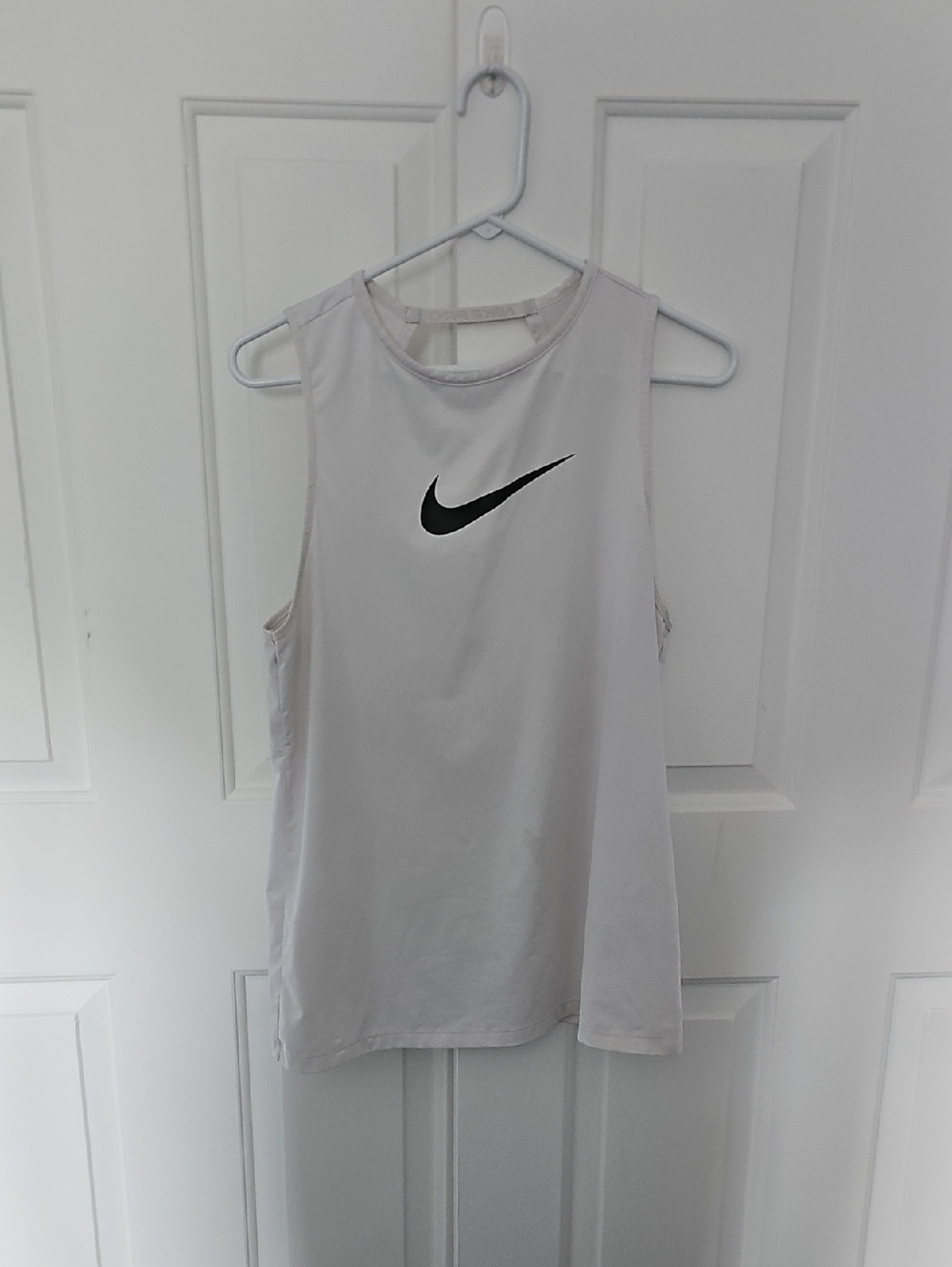 Nike White Sleeveless Workout Tank with Black Swoosh Logo